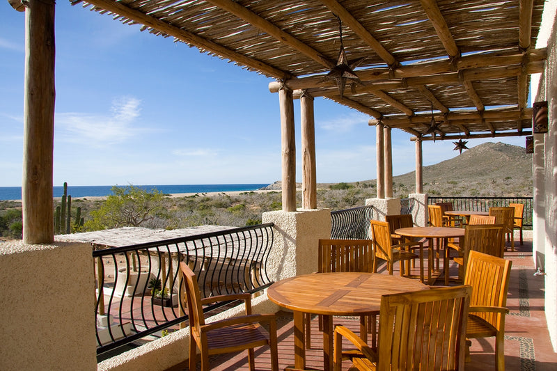 Outdoor dining area overlooking ocean